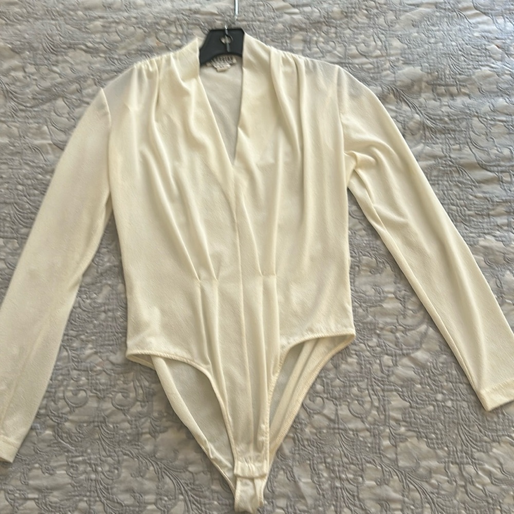 Cream color long sleeve sheer body suit size Small